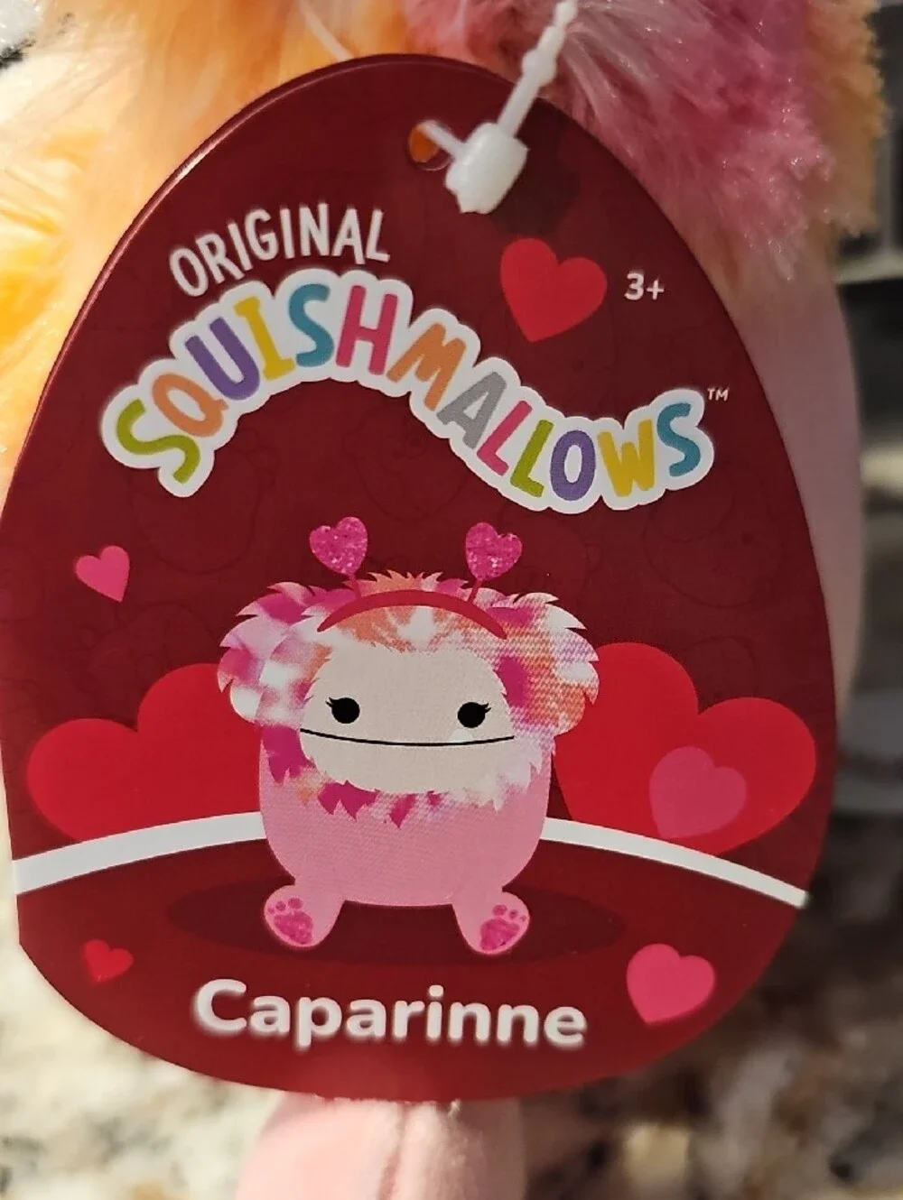 Squishmallows Caparinne Plush - Pink with Rainbow Accents